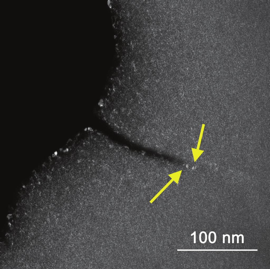 Advances in Materials Science and Engineering Figure 5: TEM dark field image of as-prepared Pd77.5 Cu6 Si16.5 metallic glass around a shear band.