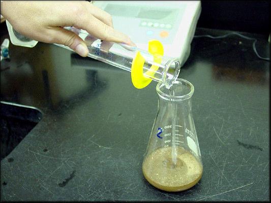 Water Addition - Forty ml of deionized water is added and then the
