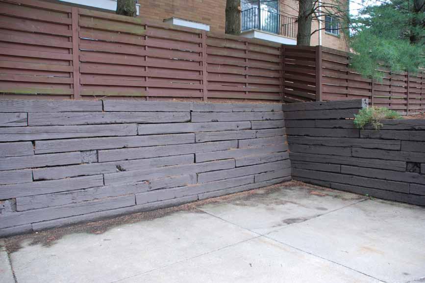 20 Three timber retaining walls were power washed and stained (2014-2015). Volunteers will stain the privacy fence (photo right) on in 2016.