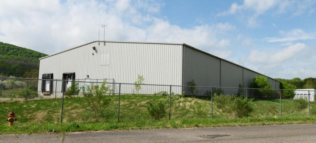 Size: 30,000 Warehouse Facility Bldg Dimensions: Construction: Floors: Roof Assembly: Ceiling Height: Lighting: Sprinklers: Bathrooms: Heating: Electrical: 100 ft.