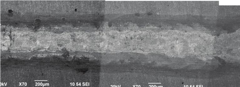 300 m Figure 6. Typical fracture surface of sheet of resistance microseam welding. Each kind of white dotted line corresponds to that shown in Figure 5a.