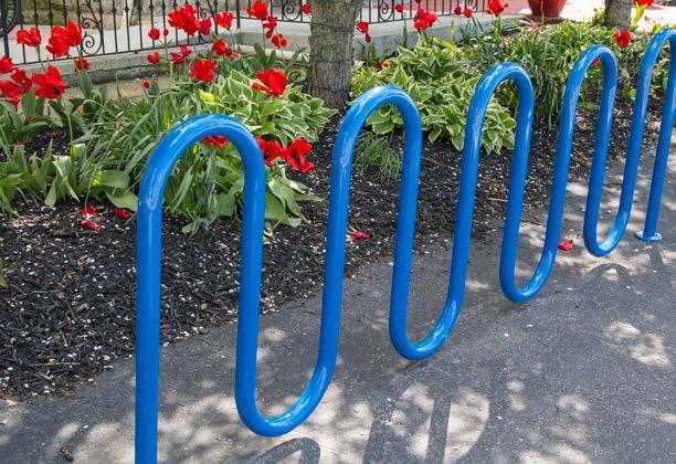 Class 2 bicycle parking facilities are short-term visitor parking facilities, which may offer some security and may be partially protected from the weather. These are usually bike racks (Image 2).