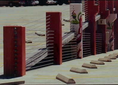 Barrier cable A vehicular barrier and/or pedestrian guard consisting of a group of parallel highstrength steel strands.