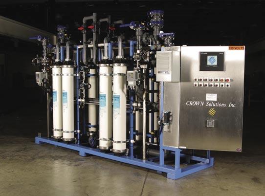 Clarifier sludge was be collected in a filter press and disposed of by the owner. The Pilot Hollow Fiber UF System and the Ultrafiltration Skid are shown in Figures 3 5.