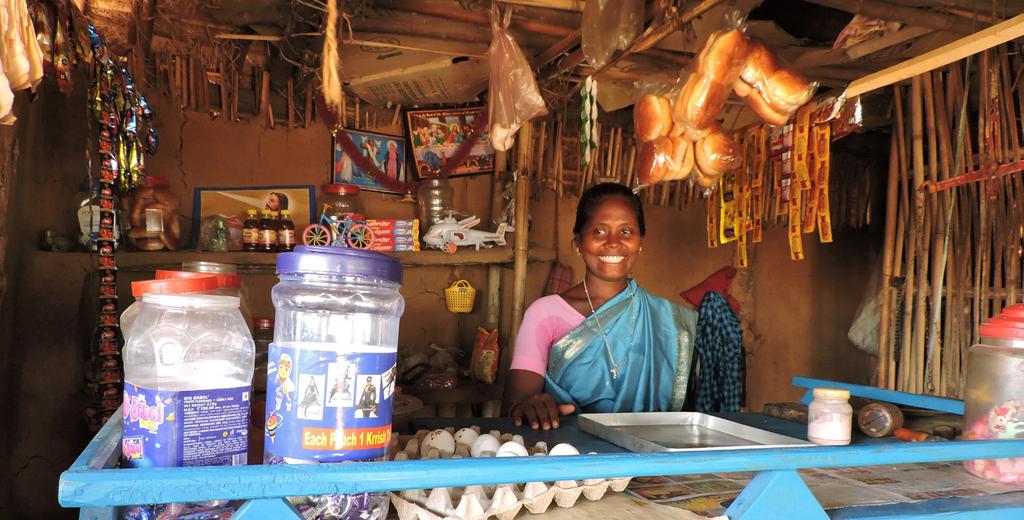 Lucy Hansda runs a small shop near a busy road in West Bengal, India.