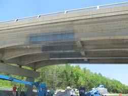 The retrofitted beams, prior to the application of the protective coating on the outside beams, are shown in Figure 13.