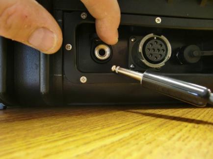 Turn the unit off using the Power Switch Locate the charge port at the rear of the STI-350 STI-350 Charging Port Plug!