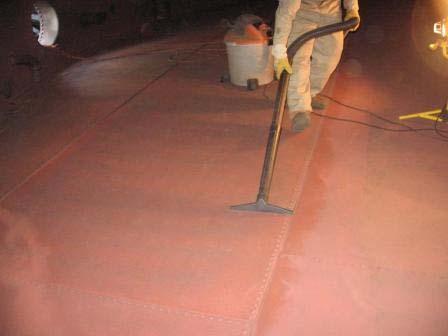 Preparing for Coating Application Vacuuming the floor