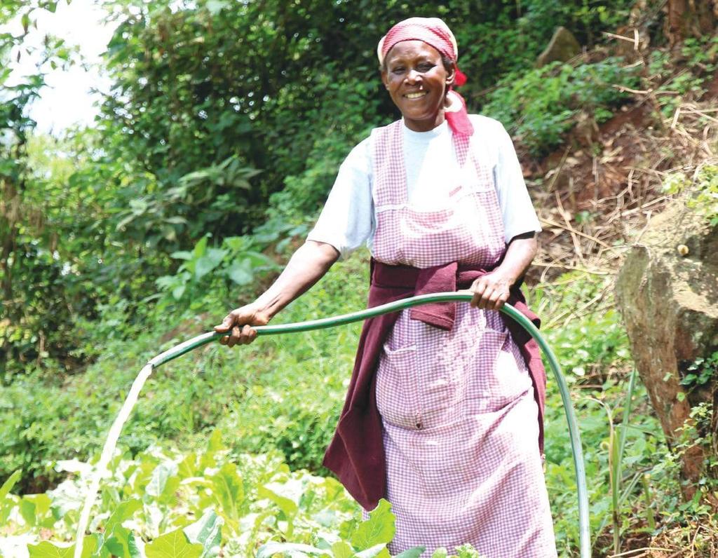 MONIKA S STORY 5 years ago, Monika Nduko s life was very different than it is today. Her lush green farm sits at the bottom of a large hill below her house, but it wasn t always this green.