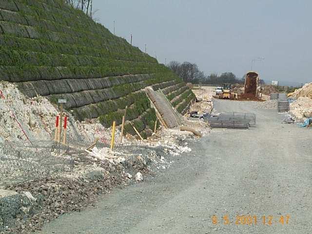 Figure 7. Steep slope with geogrid wrap-around facing Figure 8.