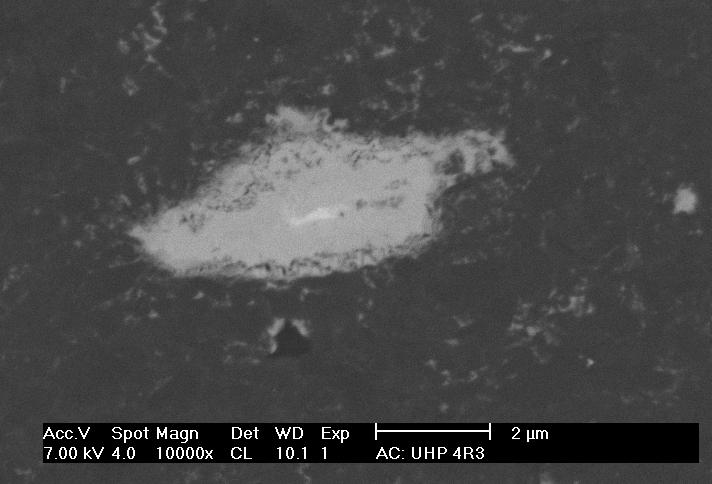 Figure 6.10 Core rim structure observed in the UHP4R3 (4 mass- % sintering additive content material).