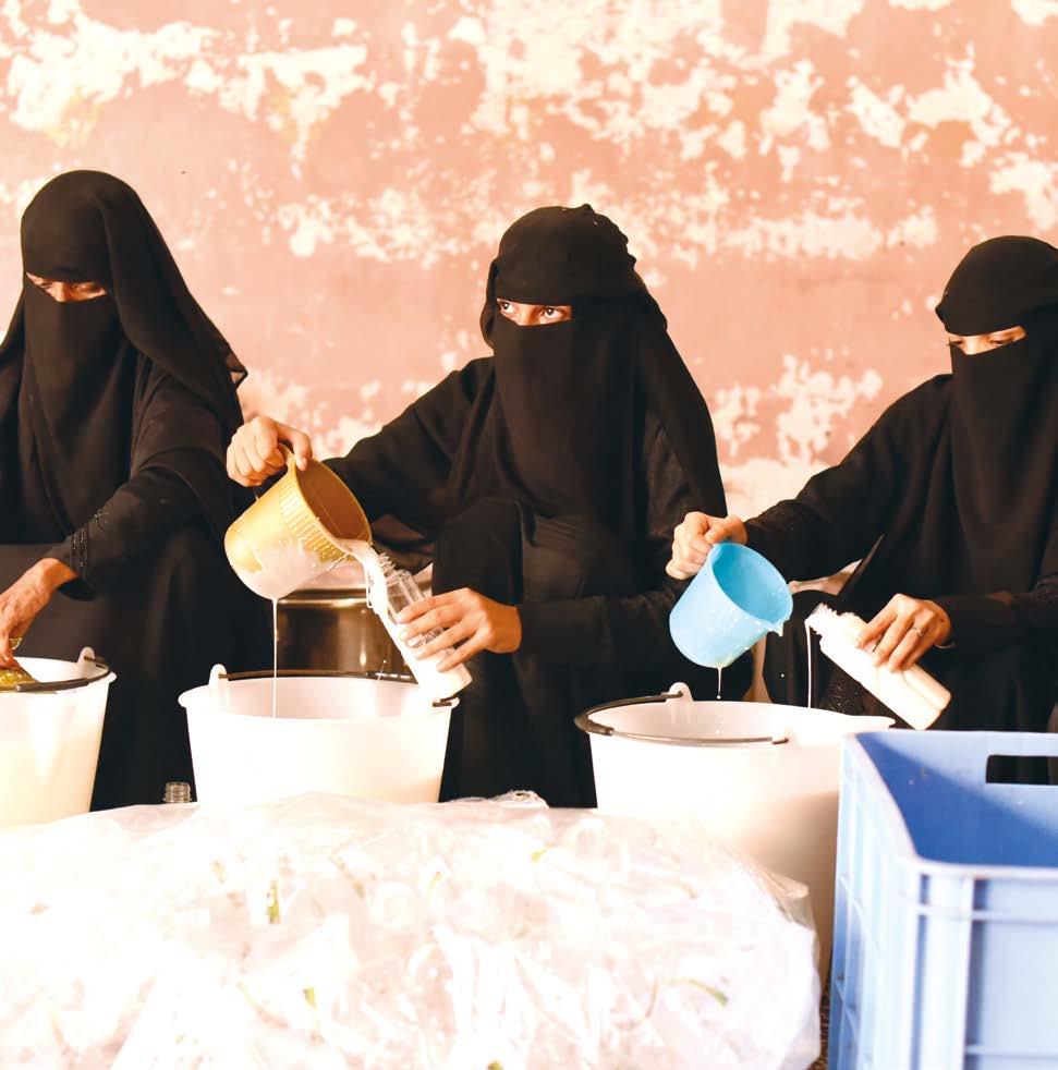 FAO/Moayed Alshaibani Photo: Women prepare raw milk to sell at the local market in Al Hudaydah.