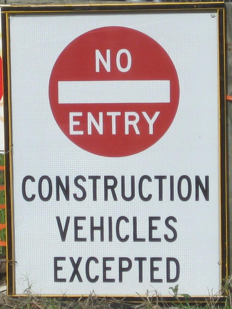 Drivers sometimes follow construction vehicles behind the barriers and into the site. Signs and cross hatched lines on the road help to prevent these intrusions.