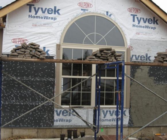 barrier, weep screed, and stucco lathe are not properly layered.