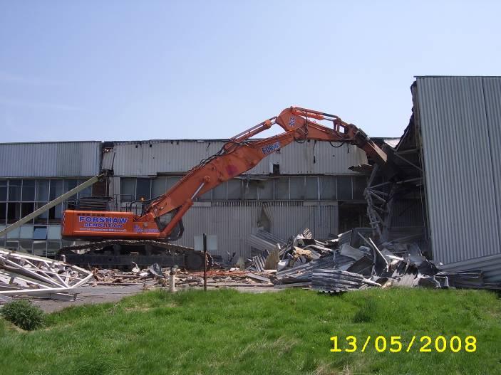 Ongoing demolition with careful