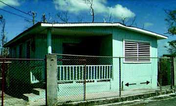 STRUCTURAL PERFORMANCE Section 4 4.4 Hold-Down Cables Tiedown or hold-down cables were used on some self-built wood-frame homes in Puerto Rico as a low-cost mitigation attempt.