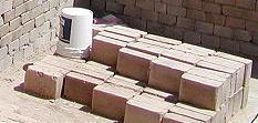 CEB/ Compressed earth block 8-10 INCHES/ 20-25 cm THICK 35%- 45% LIGHTER THAN EARTHBAG