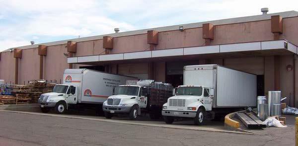 Figure 5.2. Loading Docks with an Overhang to Prevent Material Contact with Rainwater. Activities such as fueling operations may be more conveniently covered by an island-type overhanging roof.