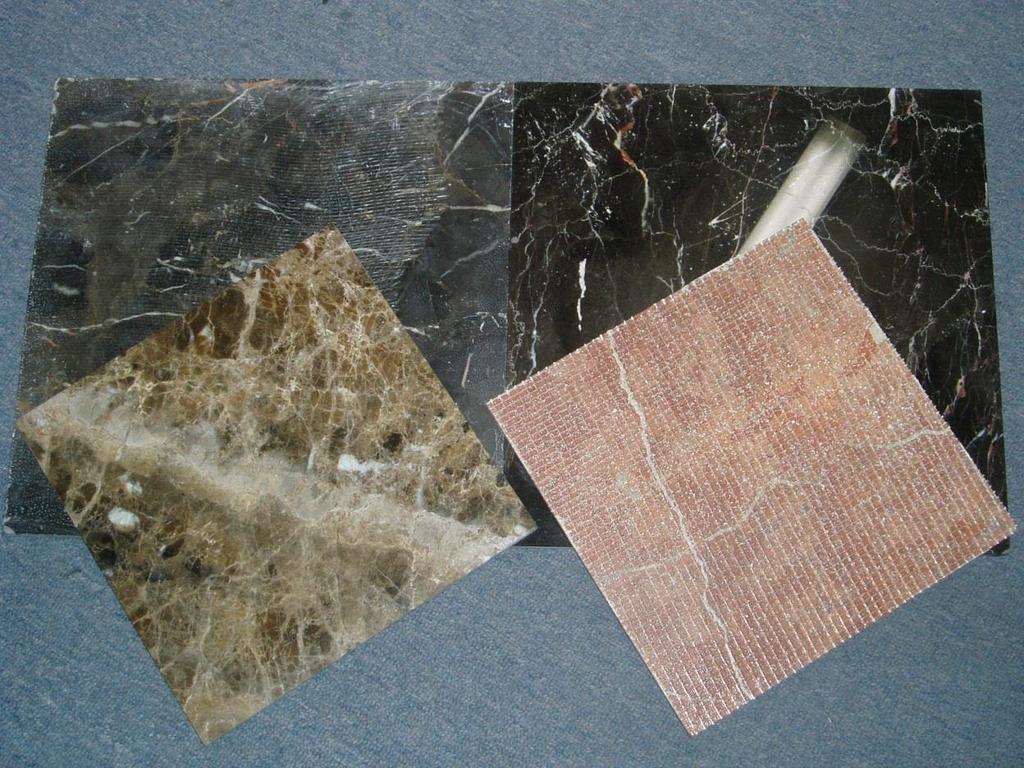 The above examples show how greatly fractured and cracked stone (lower left and upper right shows the polished faces) may be held together by the resin reinforcement backing.
