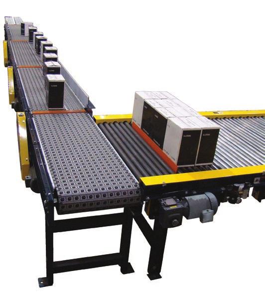 90 DEGREE CASE DESCRAMBLER NO: 512 THE APPLICATION: Descrambling, Singulating and Orienting Cases of Empty Liquor Bottles from Pallet Lines to a Cleaning and Filling Process THE PRODUCT: Chain Driven