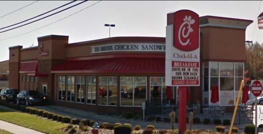 Page 3 Chick-fil-A 2 attached signs, 1 on wall extending above roof