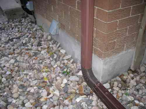 Monitoring of cracks was recommended. There were newly parged areas around the foundation.