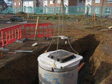 Place a reinforced concrete manhole cover slab on top. If required place a corbel slab and then add the appropriate number of adjusting units. Fit the manhole top for access from the ground.