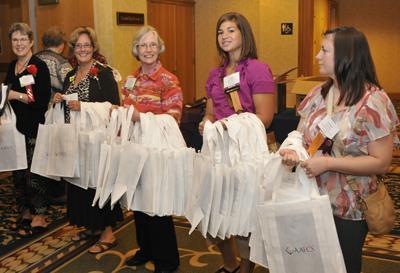 These practical tote bags are presented to all attendees and are the perfect