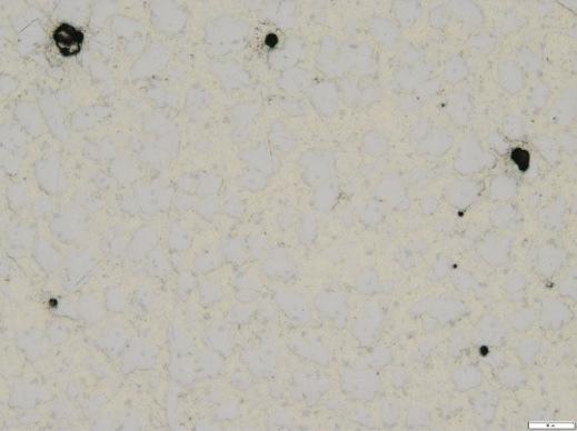 In Fig. 6a, we see the microstructure of the material of roller 1, where the relatively large pores are unevenly distributed.