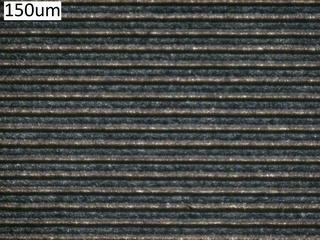 Experimental results and discussion Surface texture morphology Figure 2 is the surface texture morphology of a titanium alloy, which is obtained under the optical microscope attached to a vertical
