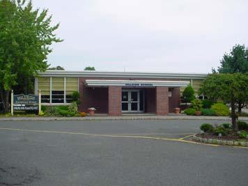 HILLSIDE ELEMENTARY SCHOOL Overview: The is located at 98 Belmont Drive and consists of a two-story building which has had a number of additions added to it over the years, the latest of which was a