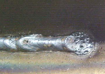 9. Porosity It is a cluster of small pores holes in the weld caused by entrapped gases during solidification. Sometimes entrapped gases give rise to to large cavities called blowholes.