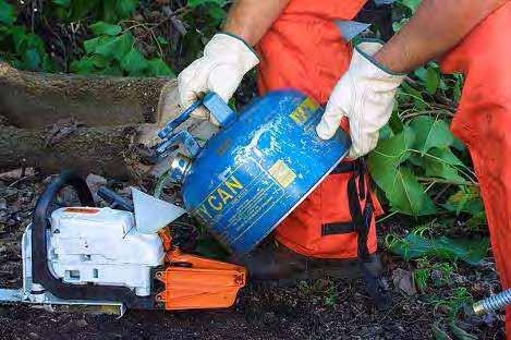 When fueling the chain saw Clean the area around the site Use only appropriate gas containers for filling &