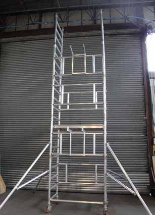 While sat on the platform take one of the brace frames from the assembly bracket and position on the opposite side with the hooks above the second rung and top rung of the third 1m frame.