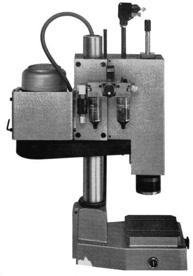 Fig. 10.37 Commercial bench-type spinwelding machine. The basic model is equipped with a 3-phase squirrel cage motor.