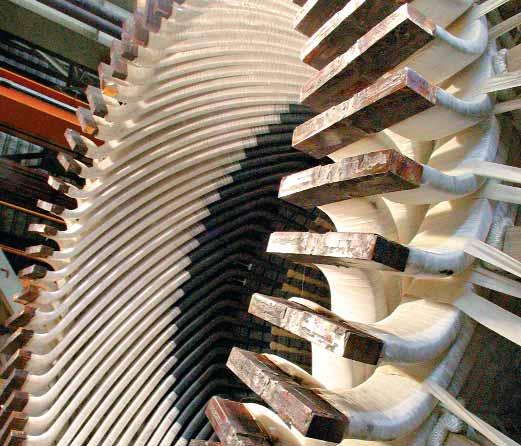 Around two thirds of the electricity is produced by the gas turbine, and the remaining third by the steam turbine coupled to it.