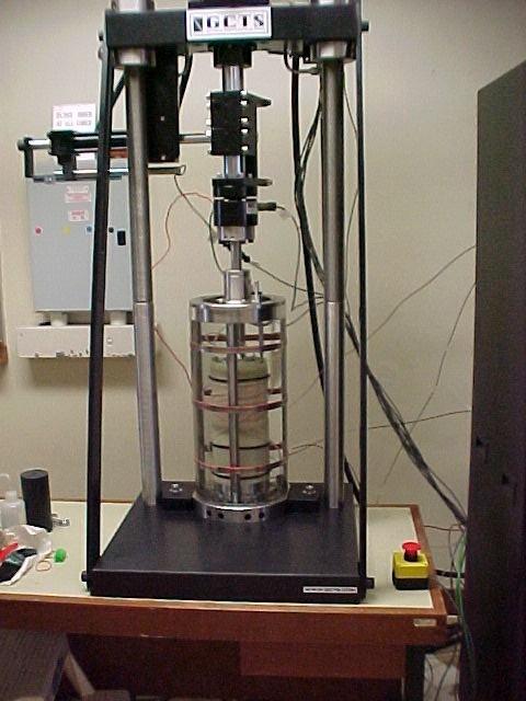 An innovative double cell system 179 4. A Truly Triaxial System (TTS) A new Truly Triaxial System has been installed in the Soil Mechanics Laboratory for soil testing as shown in Fig.9. The soil specimen has a brick-shape with a height of 150mm and a cross-section of 70mm by 70mm.