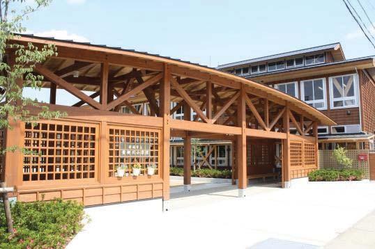 7. Tsugegawa Elementary School with Domestic Lumber (Shinshiro City, Aichi) Central gate Gable roof system in harmony with mountain landscape - Floor area: 3,126 m2 - Structure: Two-story