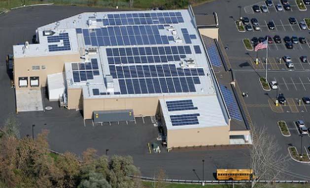 2. Solar PV System CEE s initial estimates indicate that the Mason Square building site could accommodate an estimated 1 MW scale solar PV system, depending on store rooftop design, parking lot