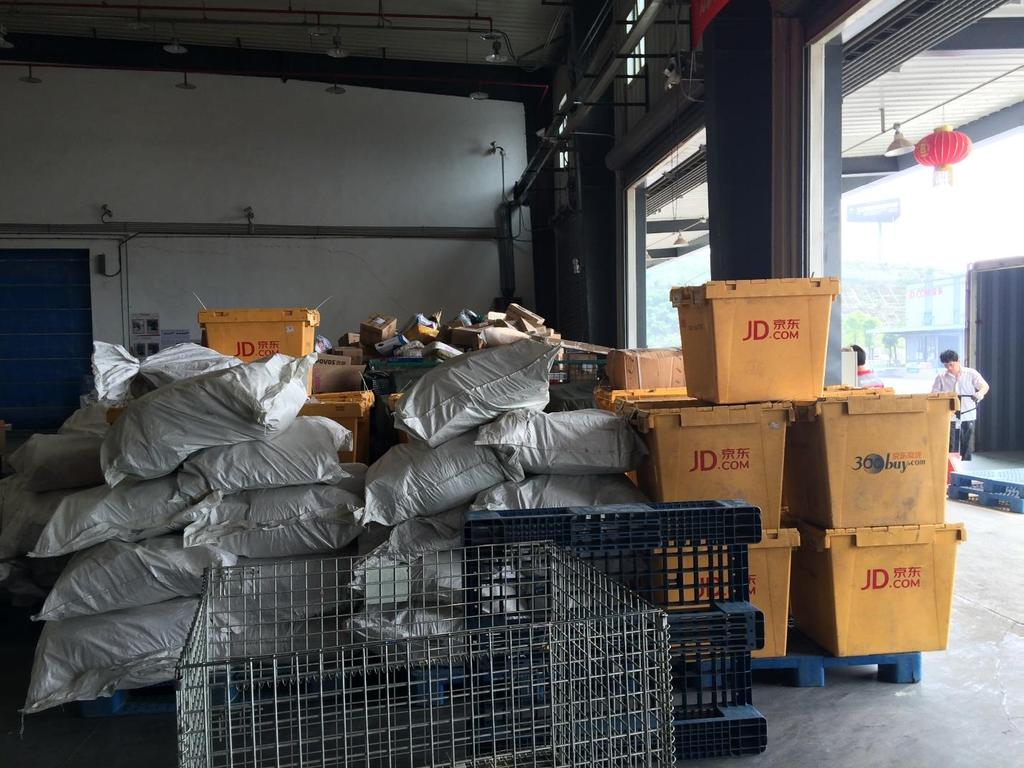 The Chinese Urban Last Mile Boxed orders and storage bins are then assembled on docks and loaded into delivery trucks bound for urban logistics depots (deconsolidation centers) covering a specific