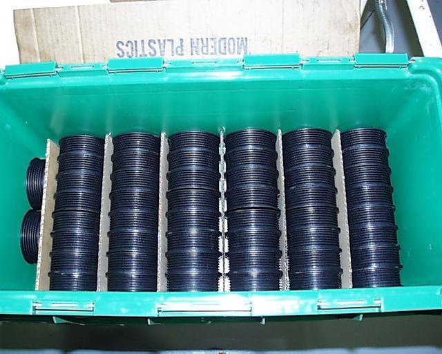 The next pictures show some examples of some plastic pulleys packed into returnable containers.
