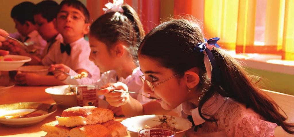 Chapter 1 Highlights The Armenian school feeding programme purchases locally-produced food. WFP/Isadora Ferreira me.