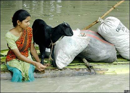 A woman transports her possessions