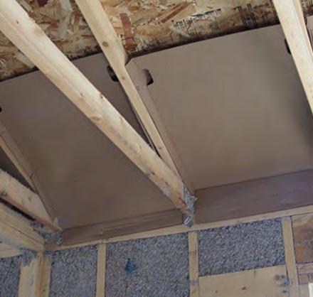For vented attics, install eave baffles on top of
