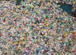 The plastic is shredded by loading it onto conveyor belts or through huge hoppers that