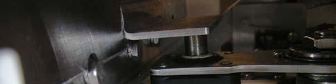 7. With the protective blade guard in place locate the center of the bearings in the