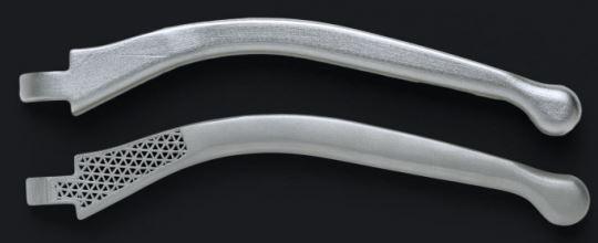 Fig. 2 Stainless steel brake levers (Courtesy Markforged) The ADAM process is capable of building fully enclosed lattice/mesh structures, resulting in parts with high strength-to-weight ratios.