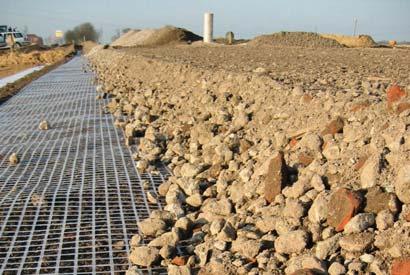 Figure 6: Crushed base course material over laid and welded Secugrid geogrid for base stabilisation in access roads 7.