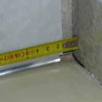 This has the advantage of keep joints well above the bath or shower edge with a horizontal