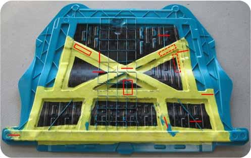 Manufacturing and analysis of a tailored underbody shield demonstrator Analysis of the underbody shield demonstrator to determine challenges in co-compression molding of tape inserts and D-LFT in